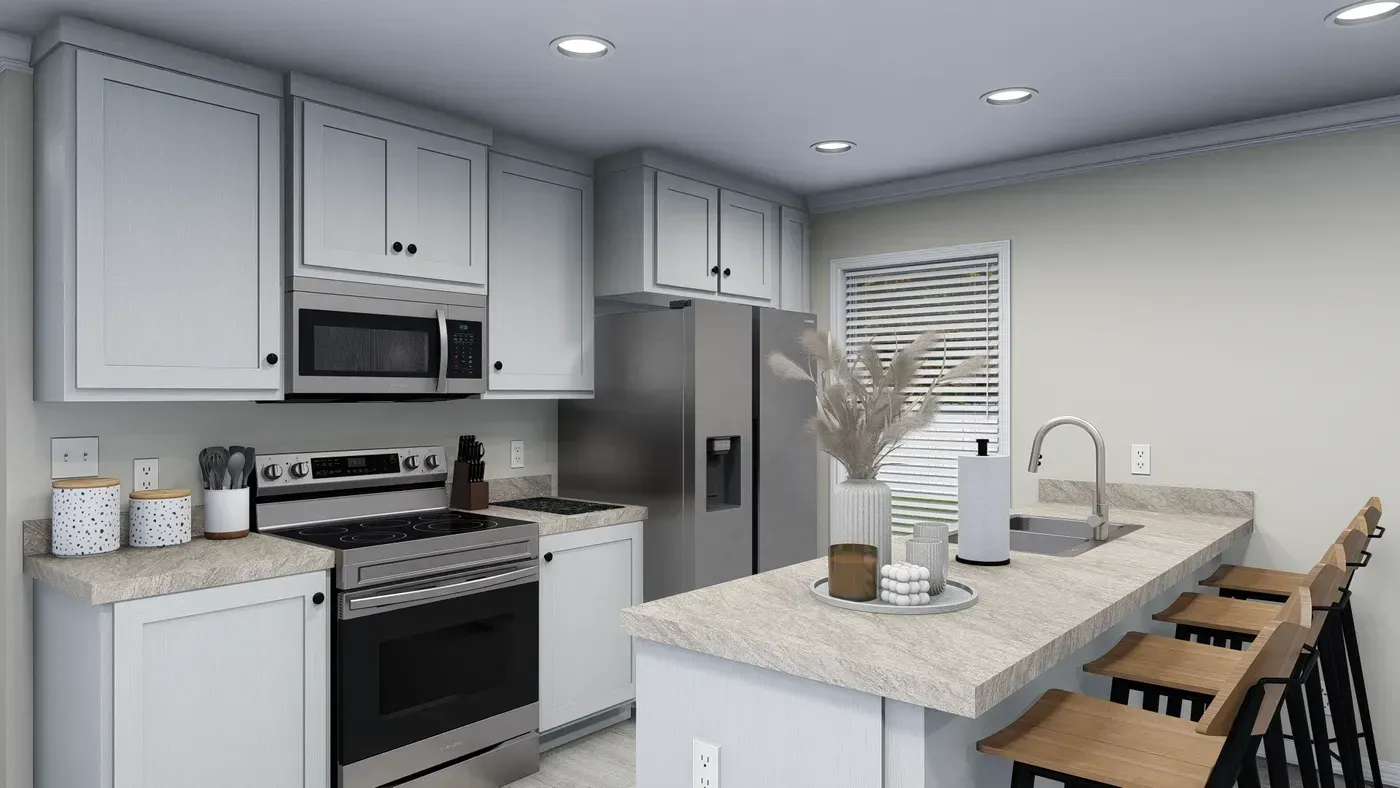 Kitchen with light gray cabinets, stainless steel appliances, and a breakfast bar with stools.