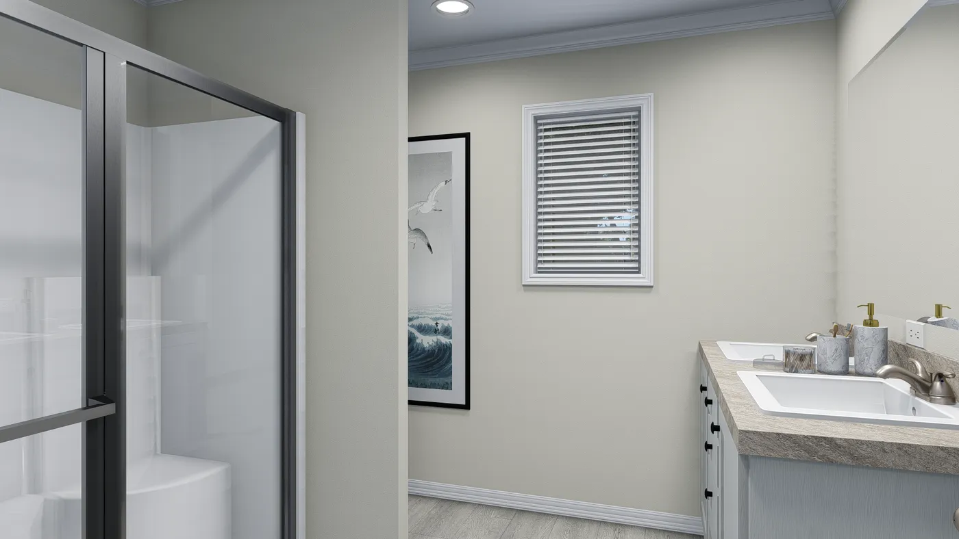 Bathroom with glass shower, sink, window with blinds, and framed art on the wall.
