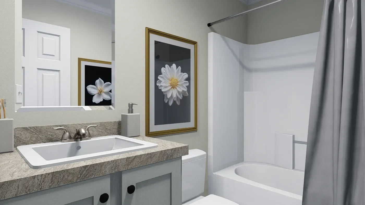 Bathroom with sink, framed floral art, and a shower/tub combo with gray curtain.