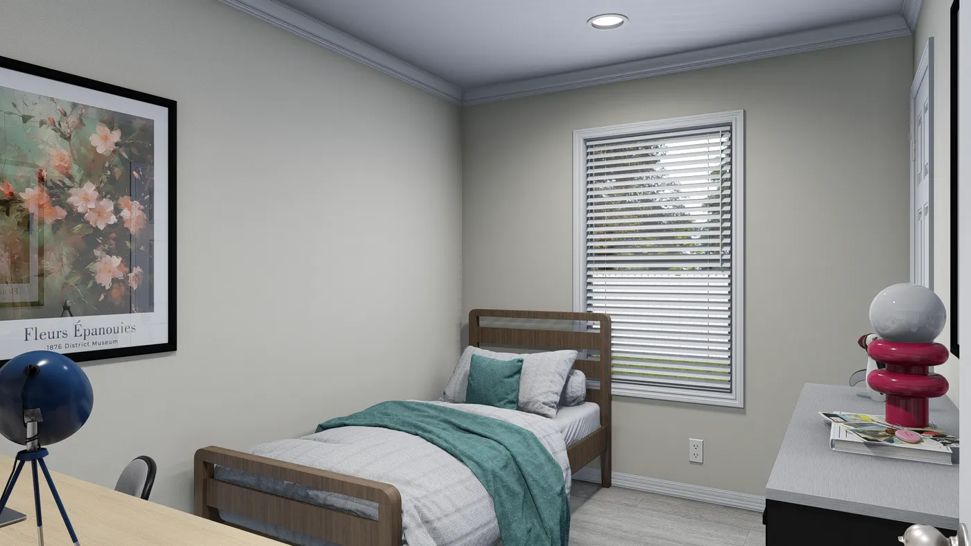 Bedroom with a bed, window, artwork, and a small desk. Light-colored walls and flooring.