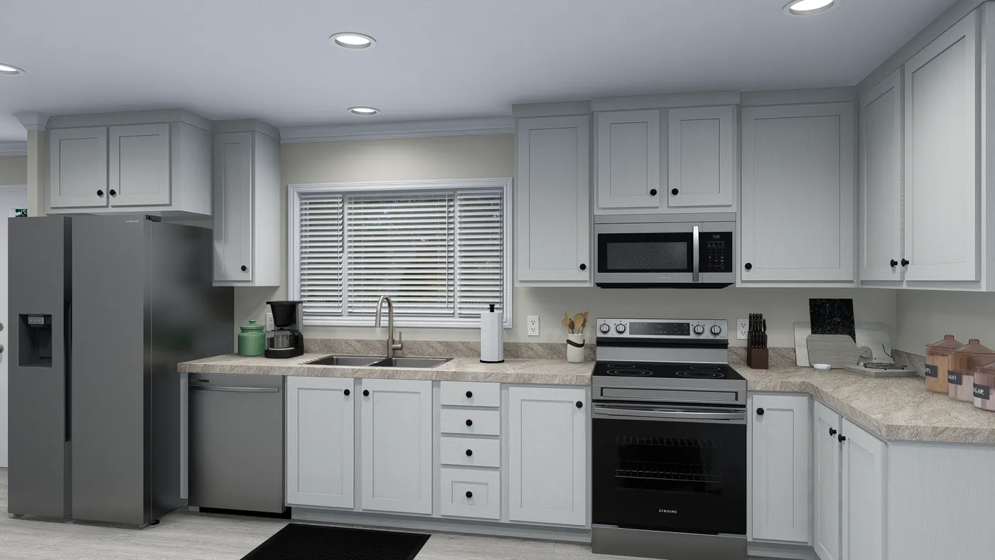 White kitchen with stainless steel appliances and white cabinetry.