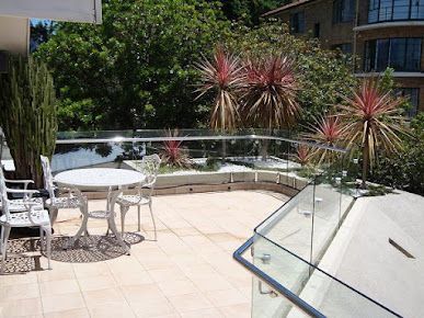 Balcony with Table and Chairs — Pool Fences in Taree South, NSW