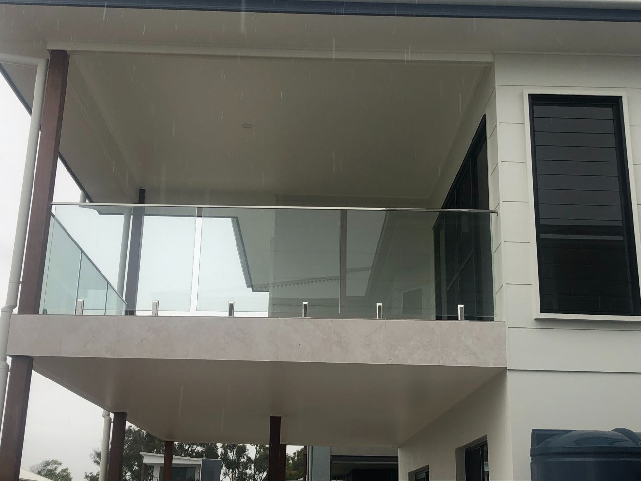 Minimalist House with Glass Balustrade — Pool Fences in Taree South, NSW