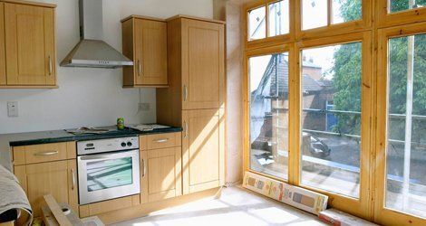 wooden cabinets made and fitted in kitchen