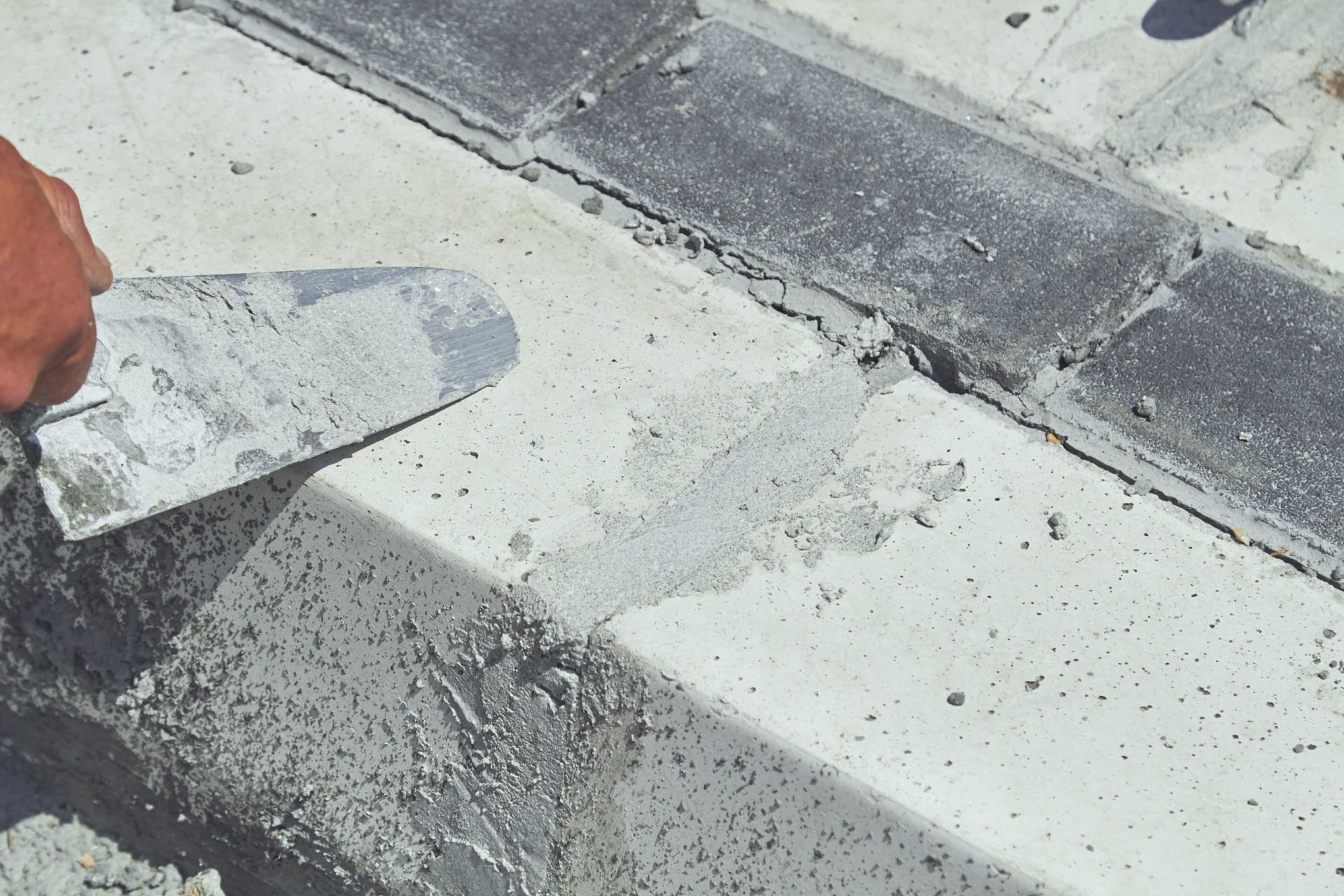 concrete repair durham nc with trowel large crack