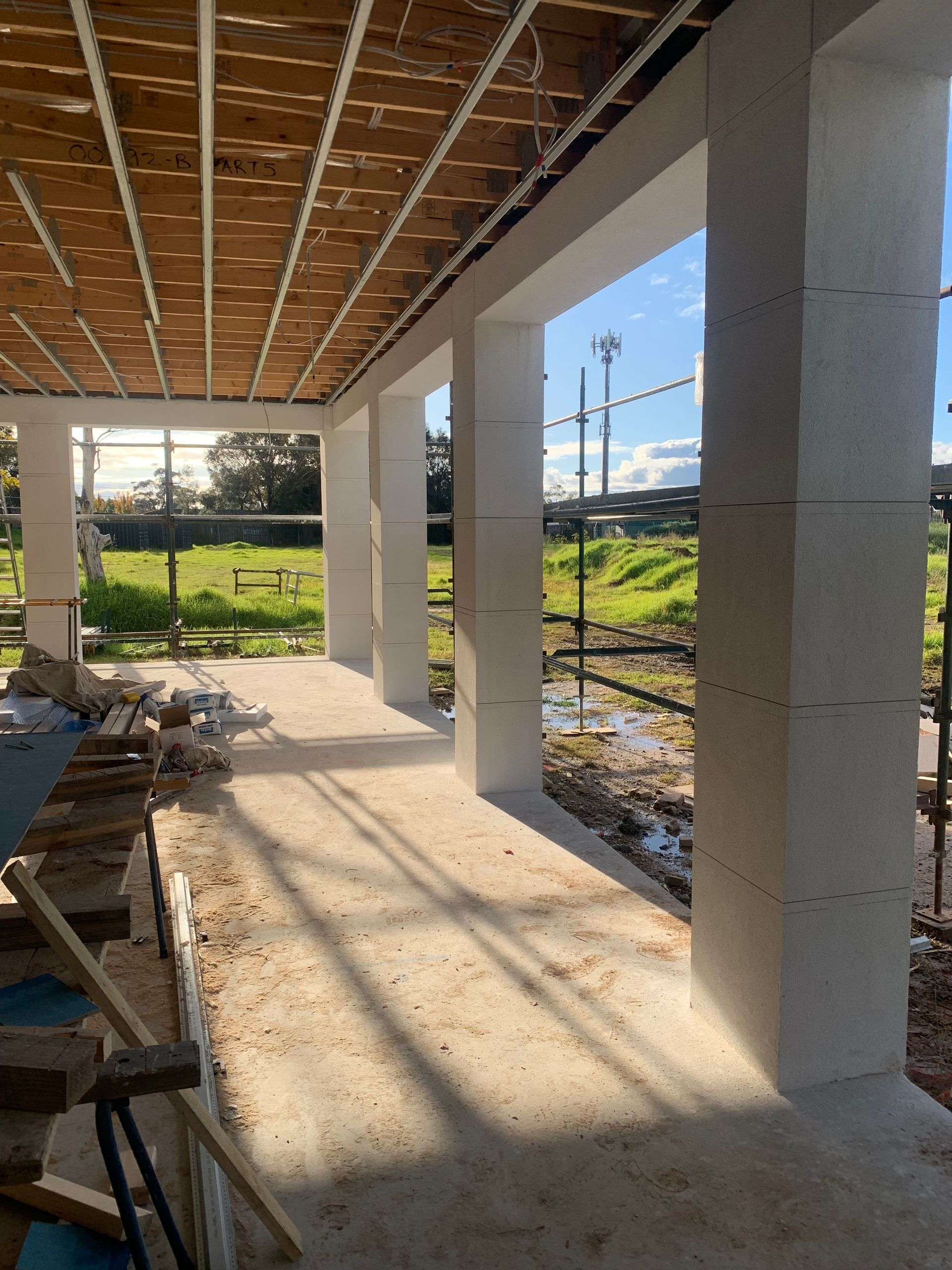 A building under construction with a lot of windows