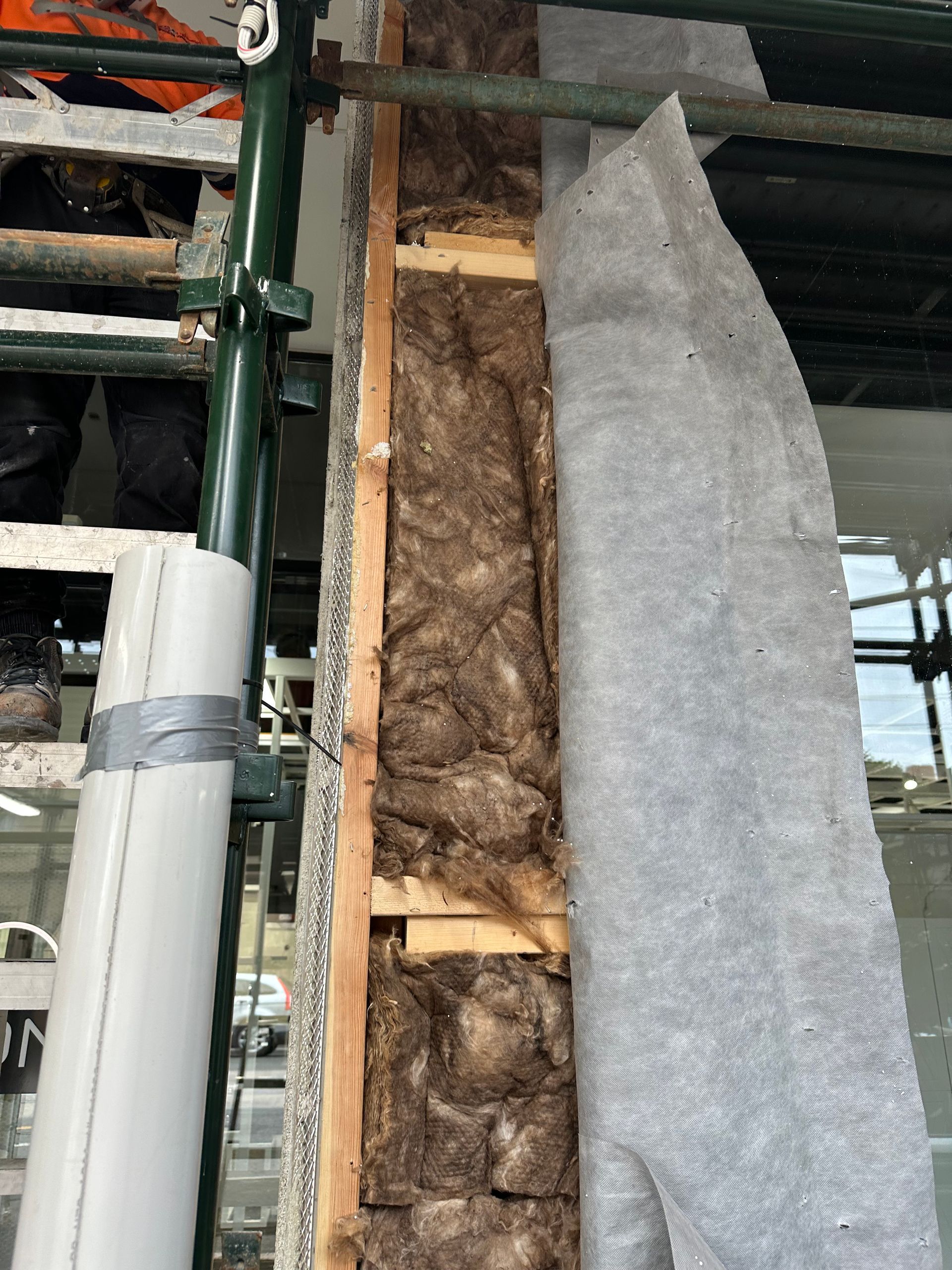 A wall with a lot of insulation on it