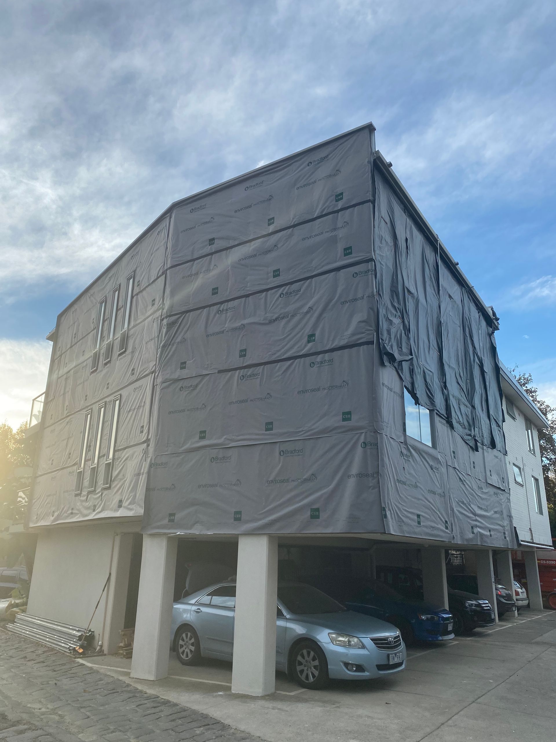 A building with cars parked in front of it