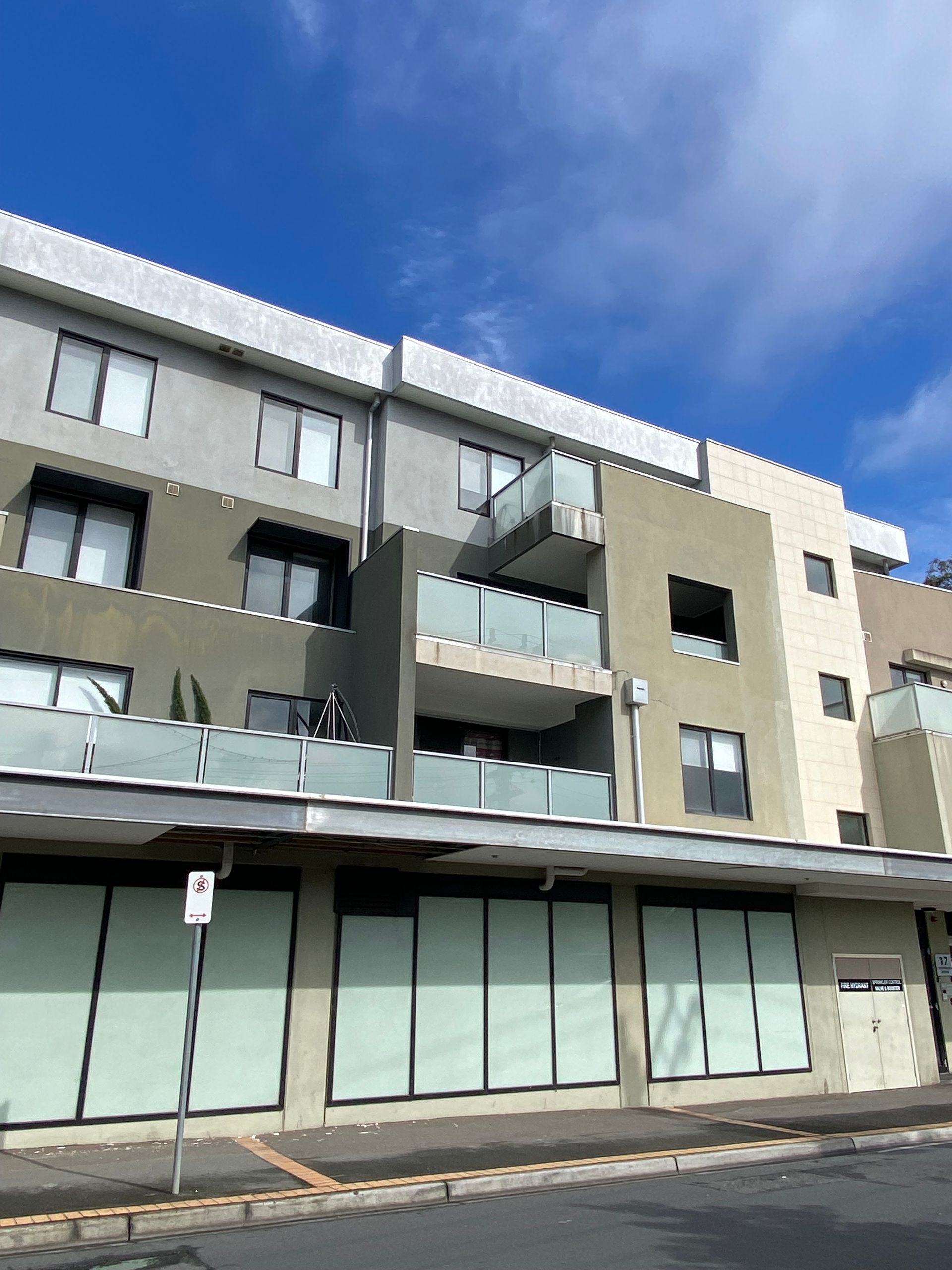 A large building with a lot of windows and balconies