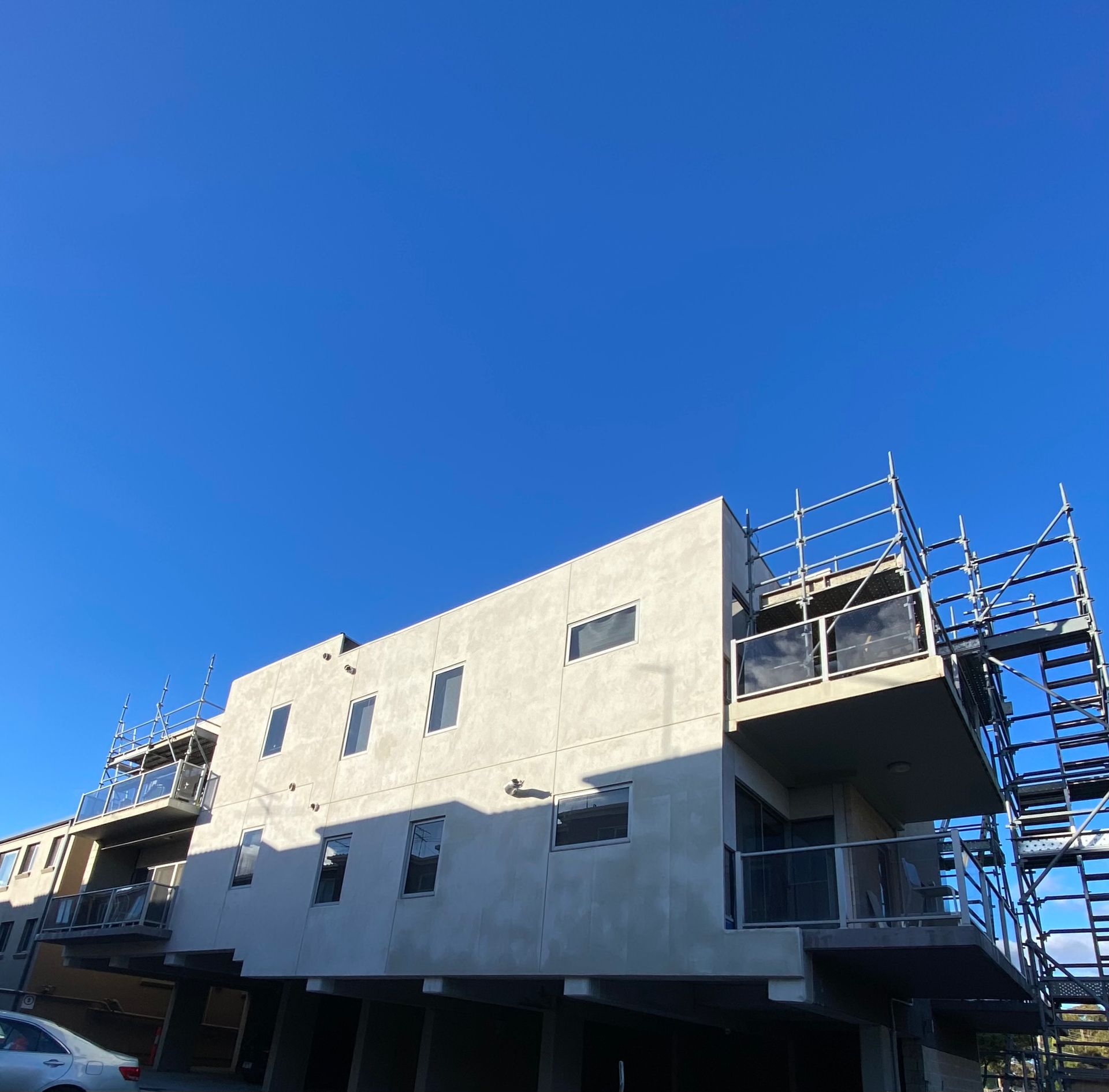 A building under construction with scaffolding on top of it