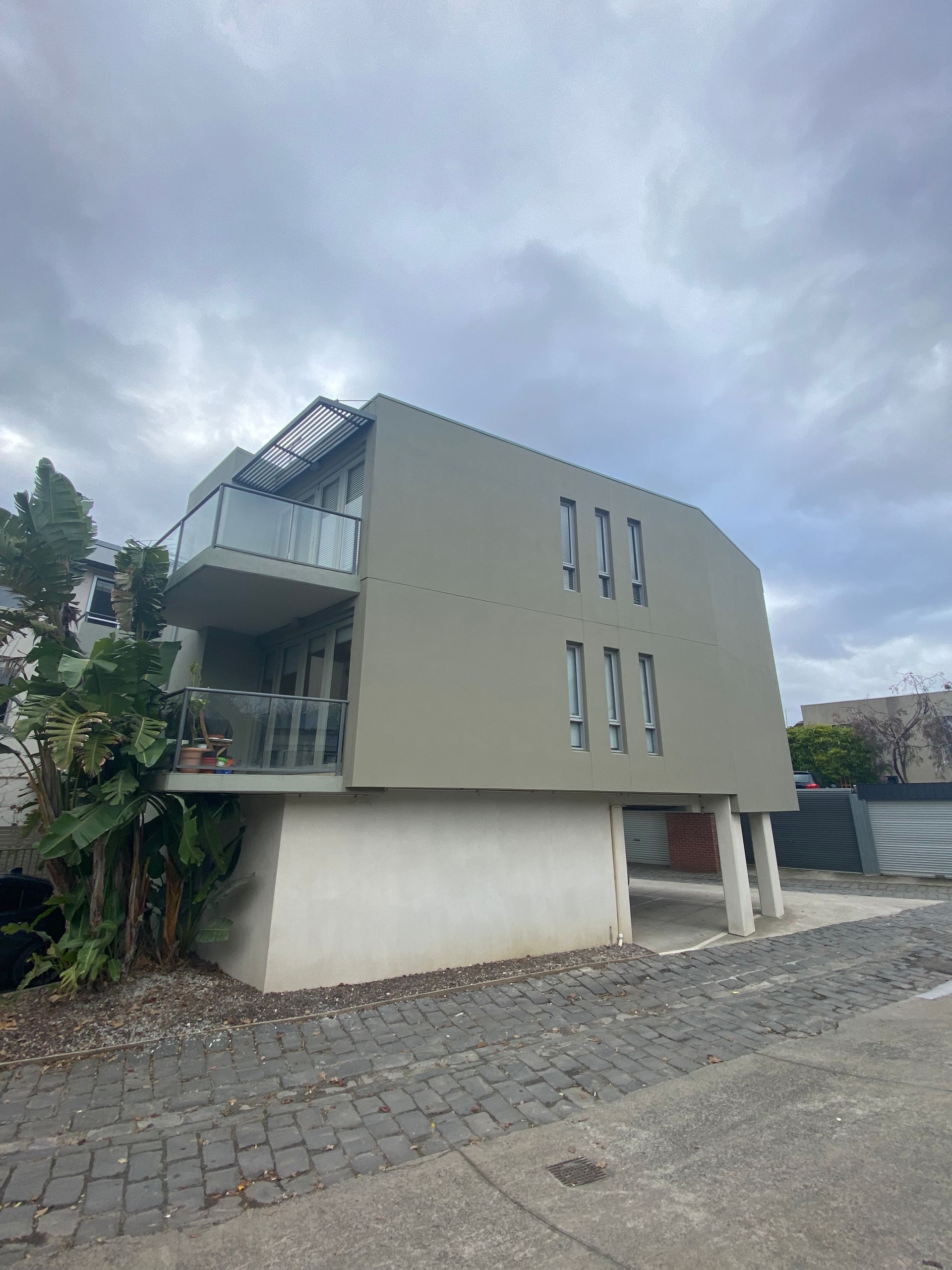 A large building with a lot of windows and balconies