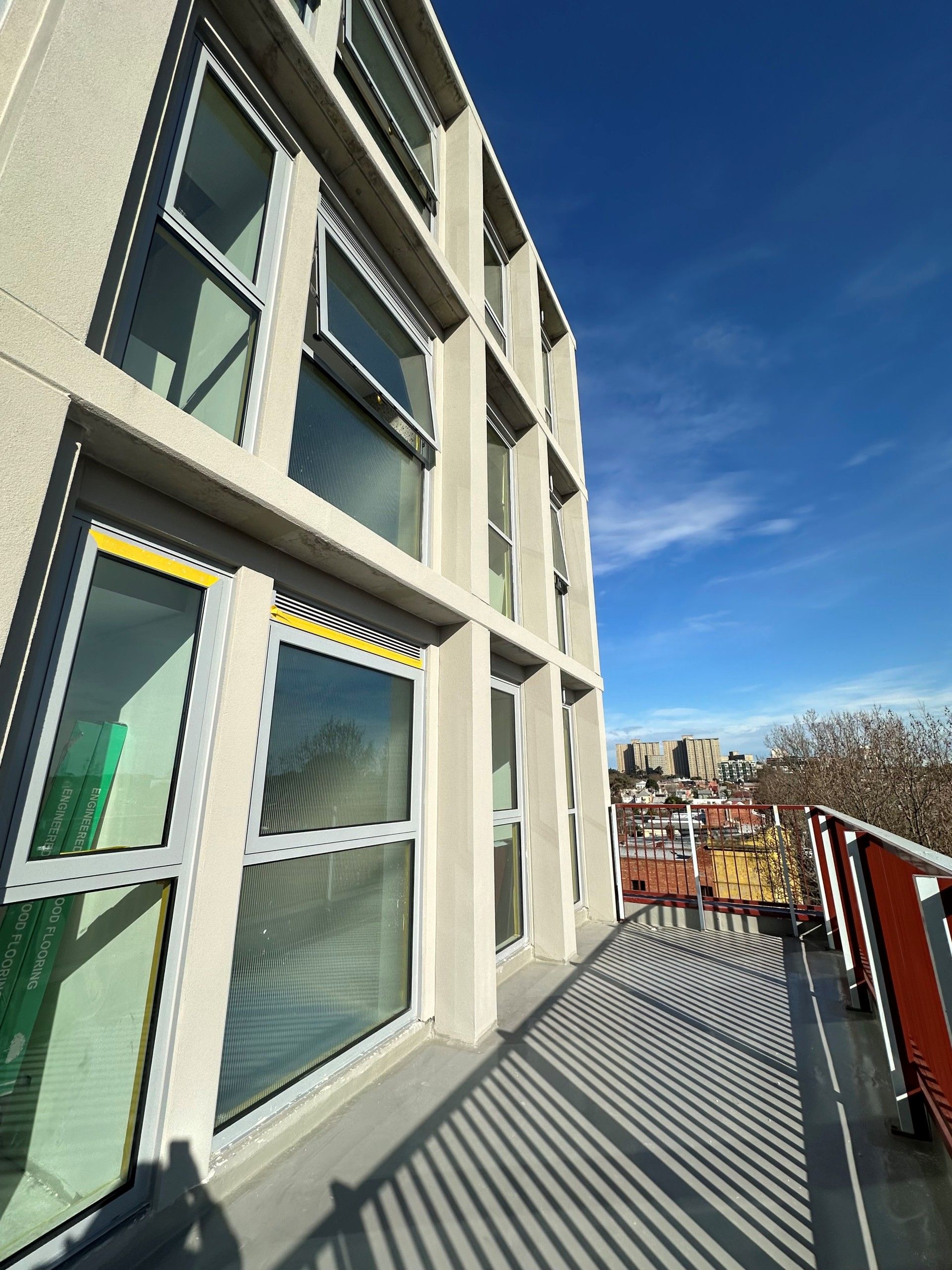 A building with a lot of windows and a balcony