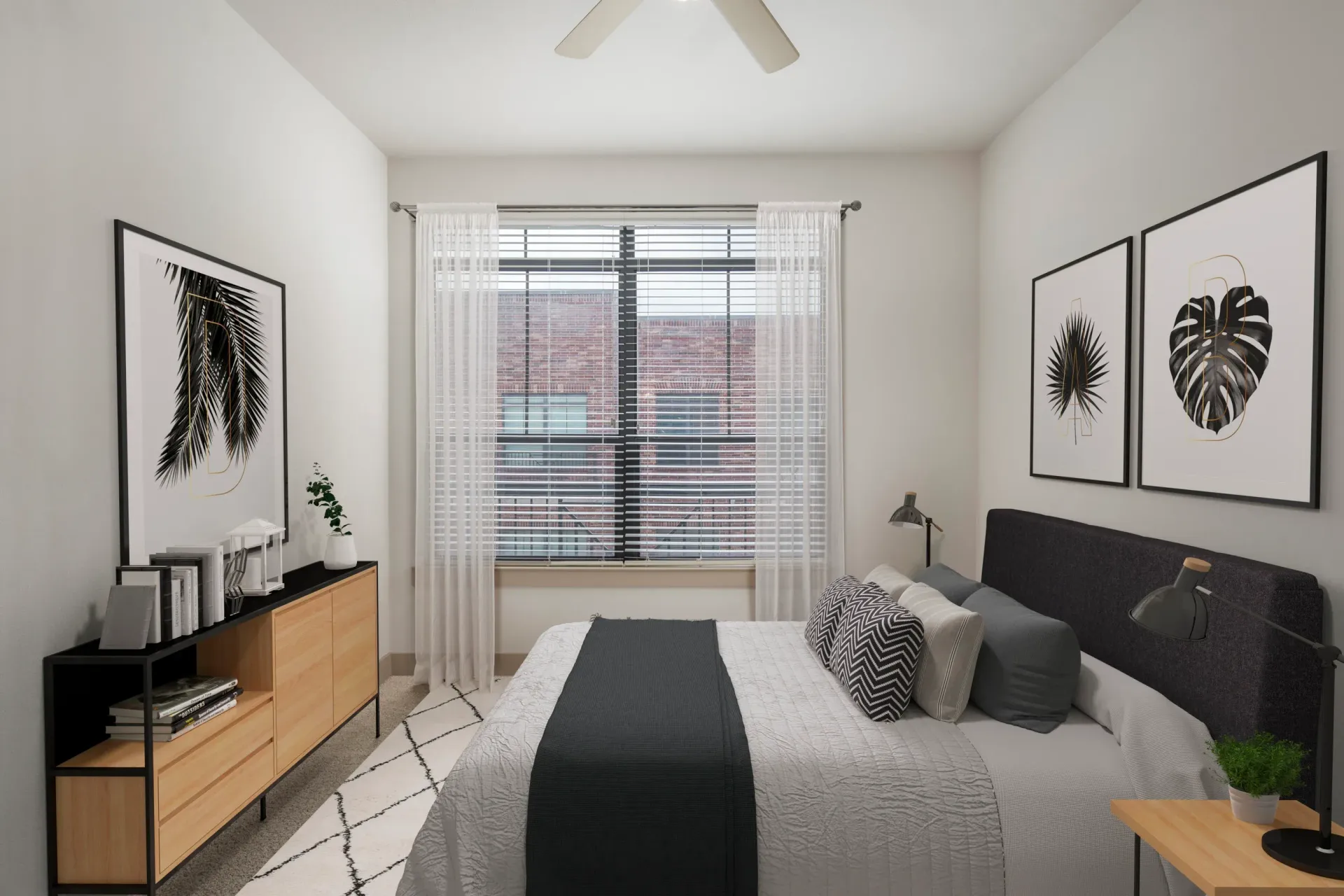 Bedroom with bed, dresser, window, and abstract art in a neutral color palette.