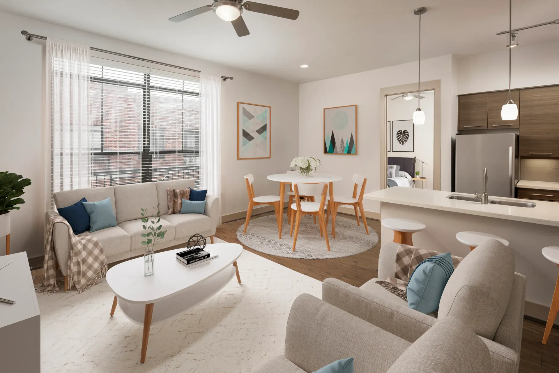 Living room with sofa, table, and dining area, light-colored walls, large windows, and modern decor.