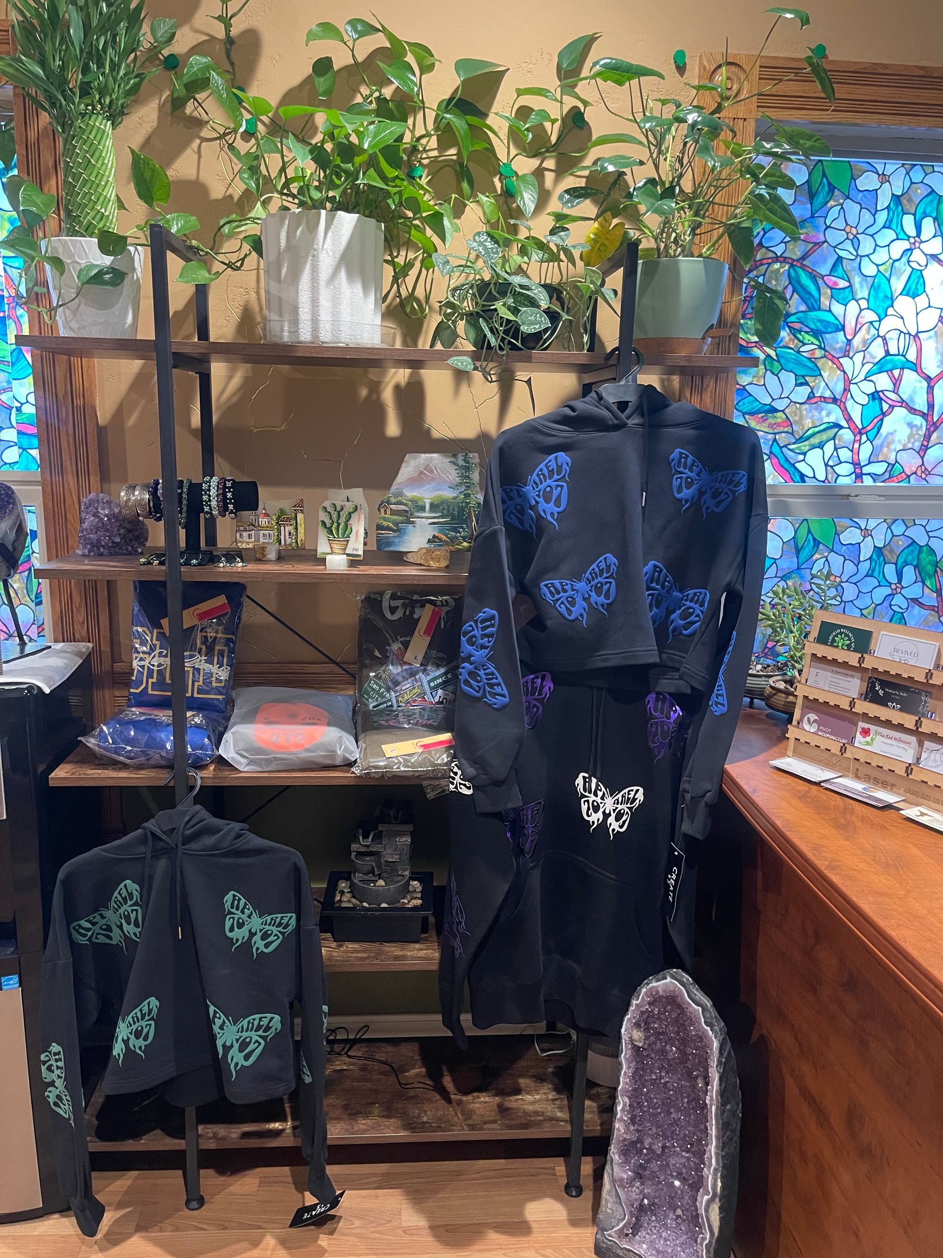 A room with a bed and a mirror on the wall