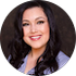 A woman with long dark hair is smiling in a circle.