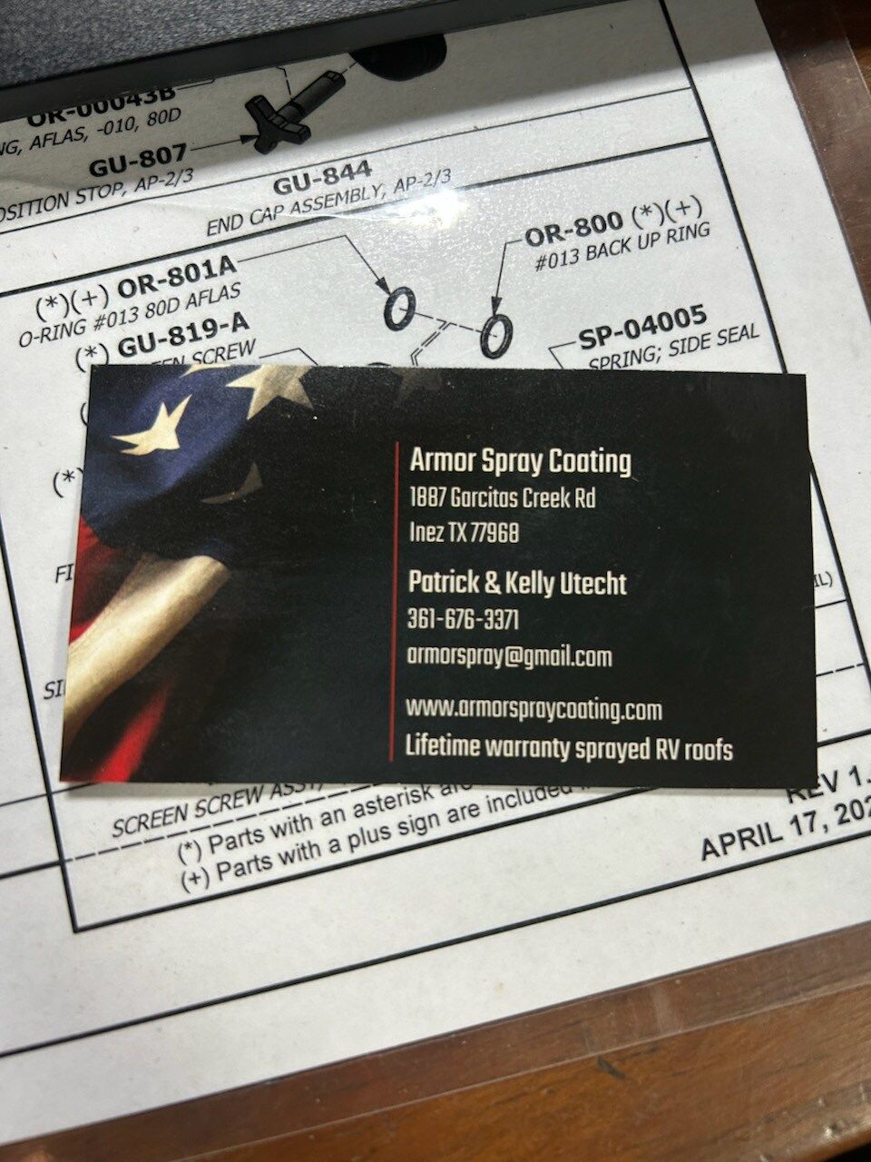 A business card that says armor spray cooling on it