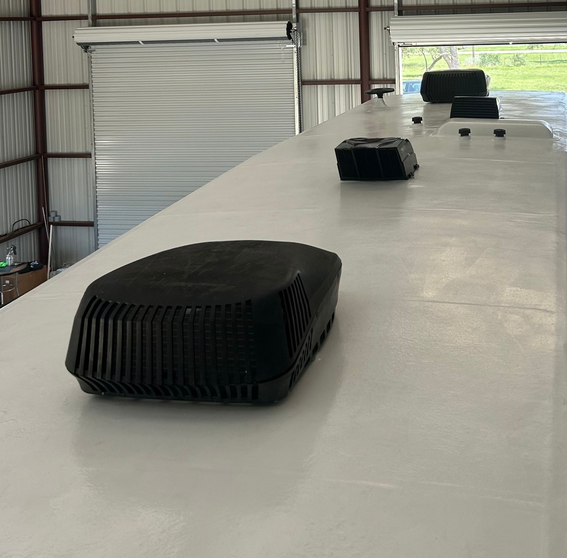 A black box is sitting on top of a white table