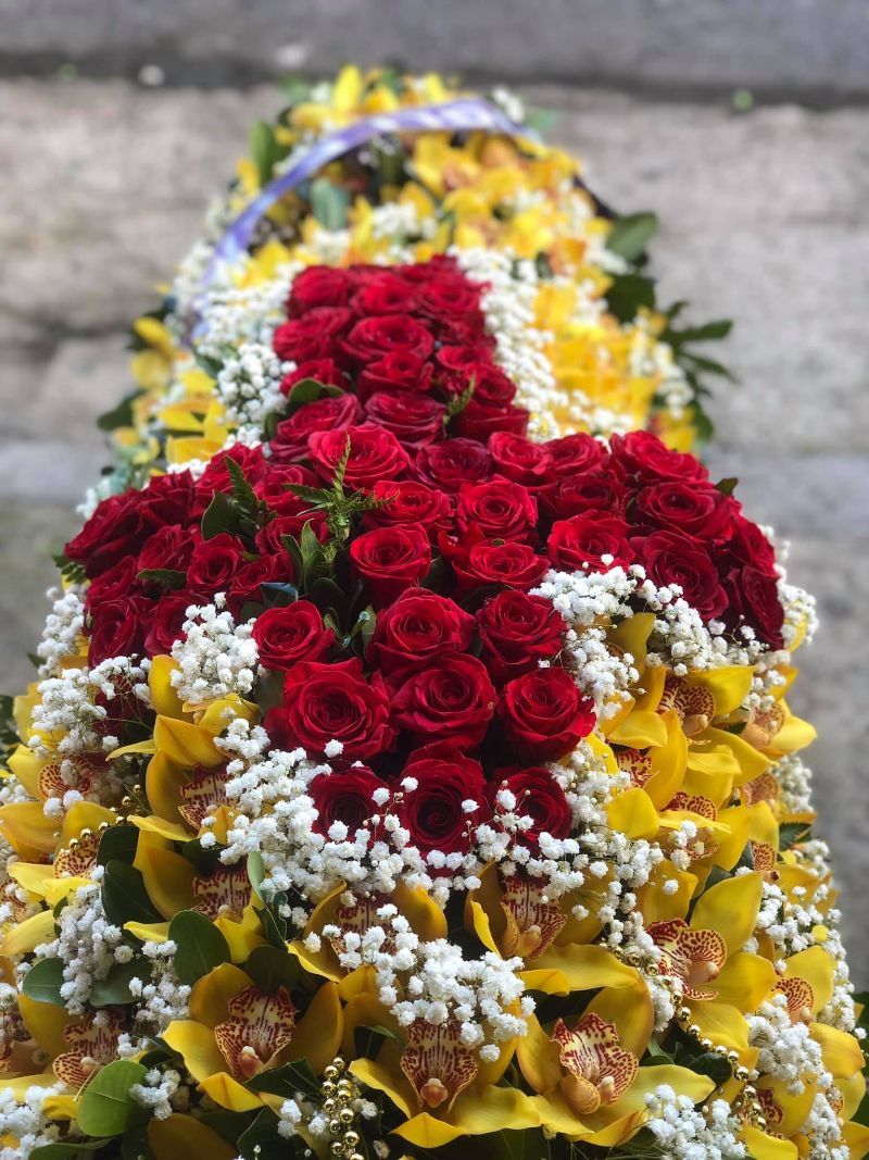 Copribara con fiori gialli e rossi