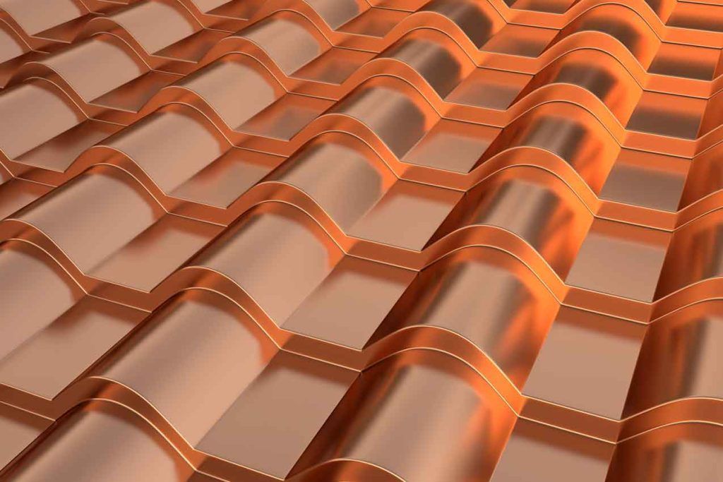 A close up of a copper tile roof