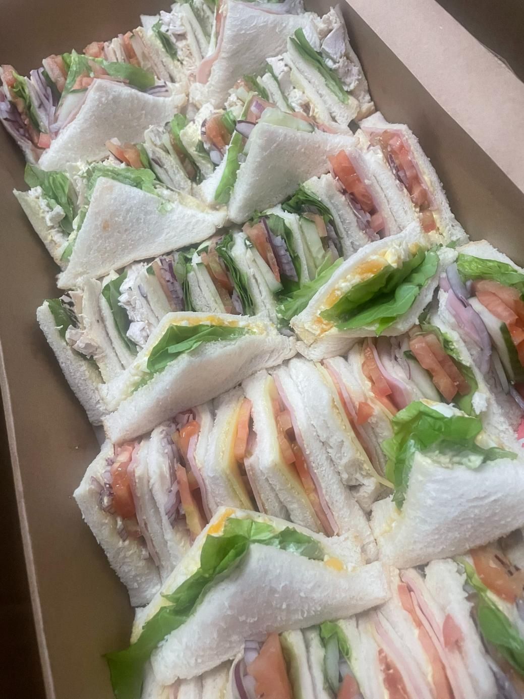 A Plate of Food With French Fries and a Salad on a Table — Cafe Nosh in Taree, NSW