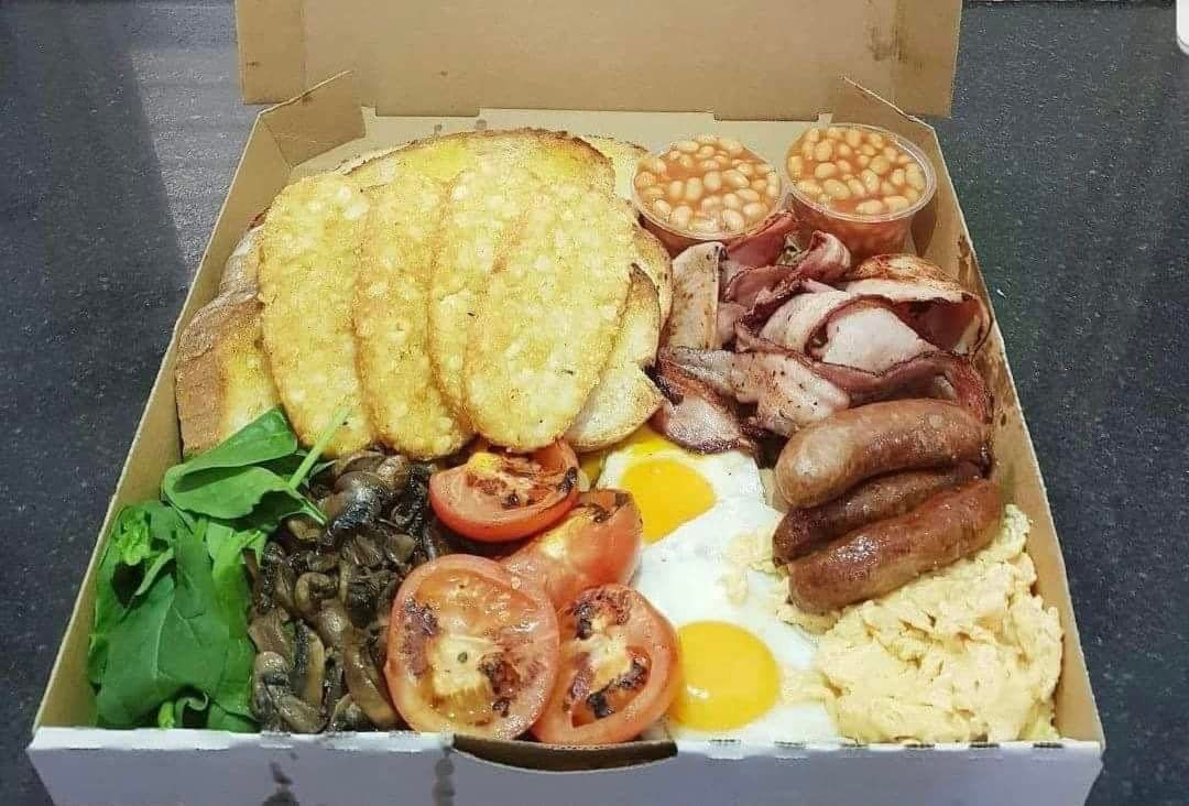 A Box Filled With a Variety of Food Including Eggs, Bacon, Tomatoes and Mushrooms — Cafe Nosh in Taree, NSW