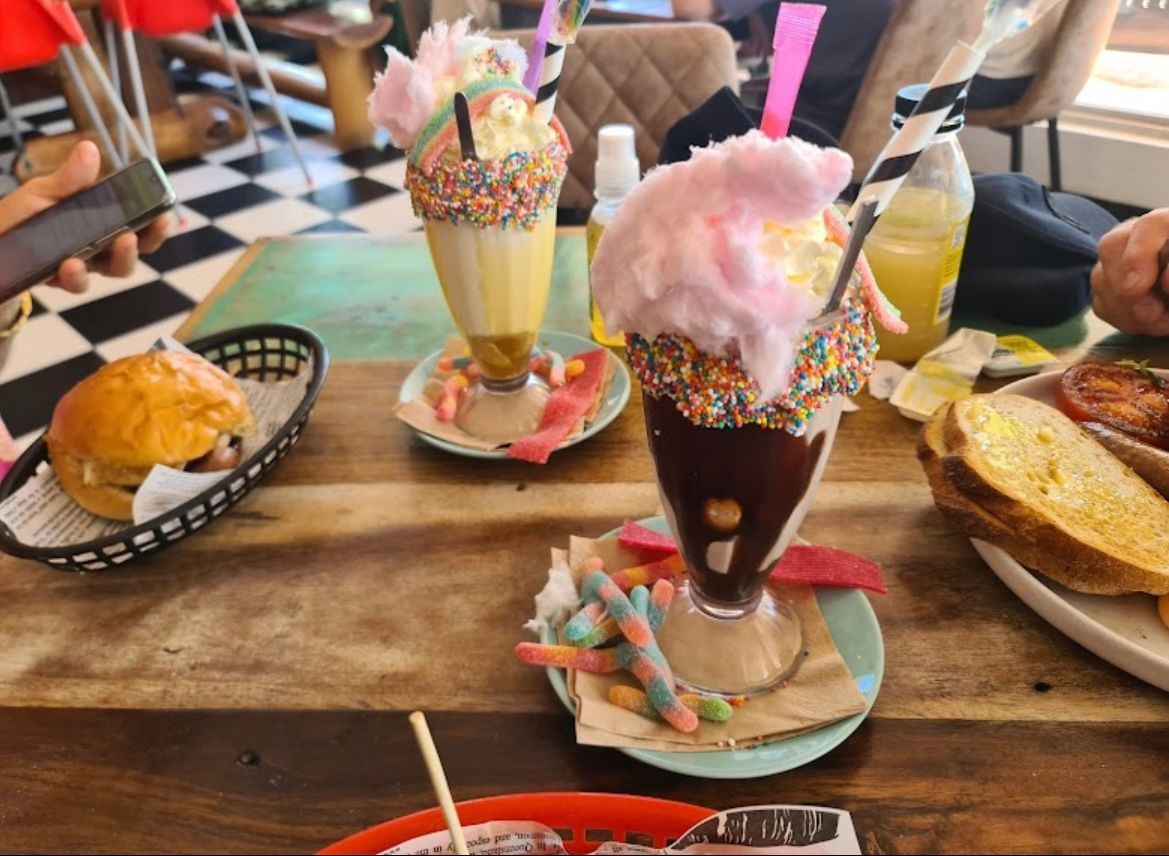 A Bowl of Salad With Meat and Vegetables on a Wooden Table — Cafe Nosh in Taree, NSW