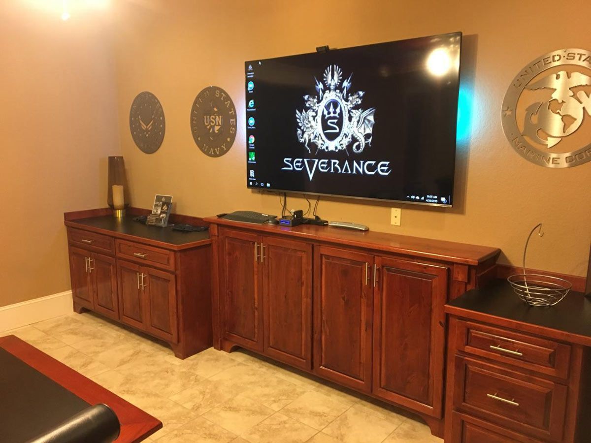 tv above cabinets