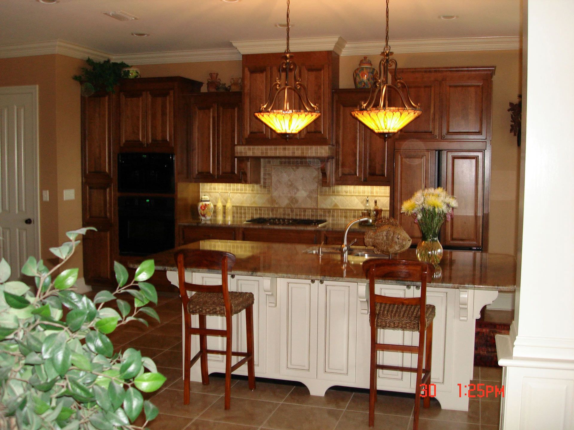 Kitchen with White and Wood cabinets