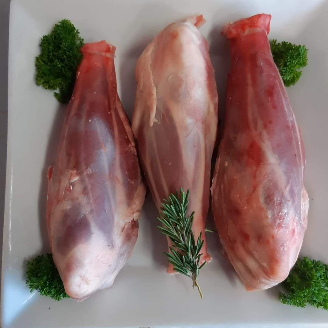 Three Raw Lamb Shanks on a White Plate — Drovers Meats in Coffs Harbour, NSW
