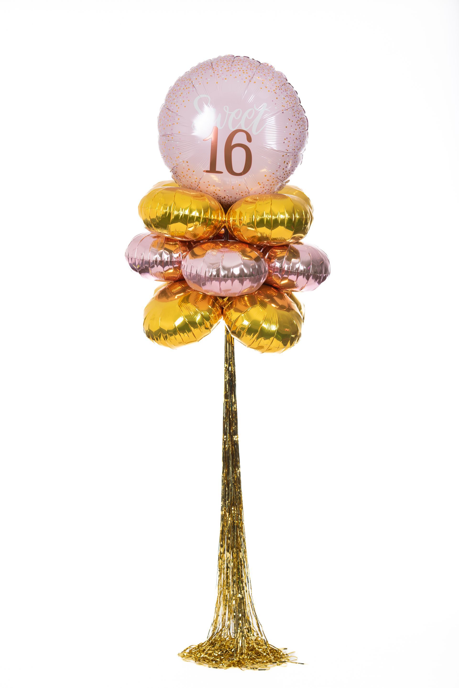 A bunch of balloons with the number 16 on them