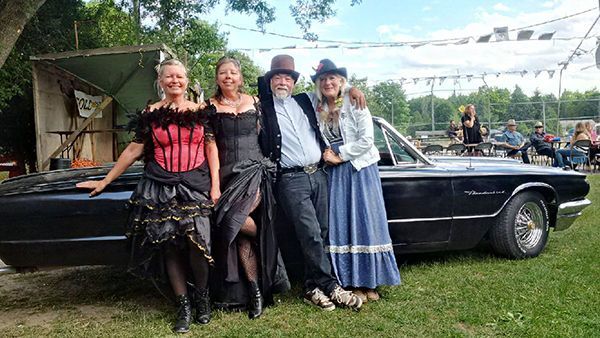 Eugenia Gold Rush visitors in costume.
