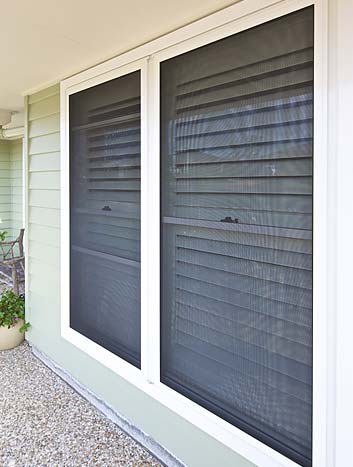 Blue Roller Blinds On Balcony — Elegant Blinds & Awnings Taree In Taree South NSW
