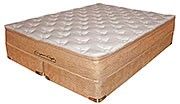 A mattress is sitting on top of a wooden box on a bed.
