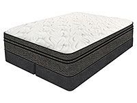 A mattress is sitting on top of a bed on a white background.