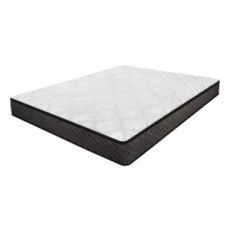 A white mattress is sitting on top of a white surface.