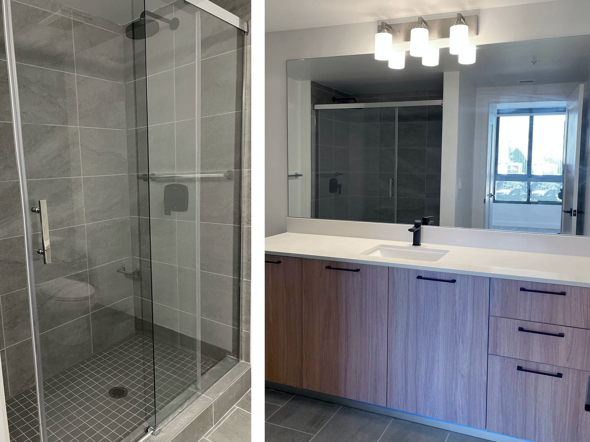 Bathroom with a glass-enclosed shower on the left and a wood-tone vanity with sink on the right.
