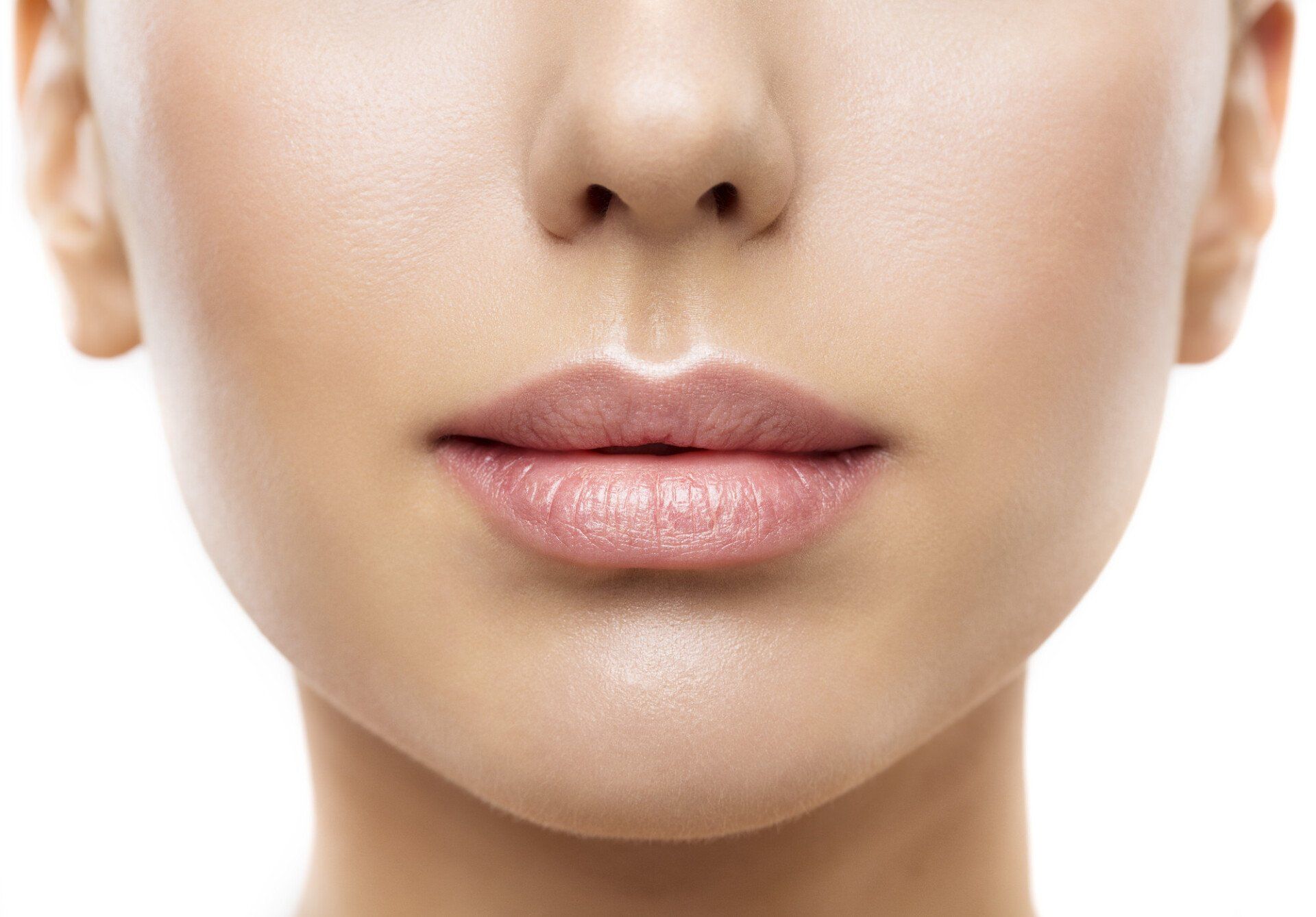 woman with thick lips after having lip fillers