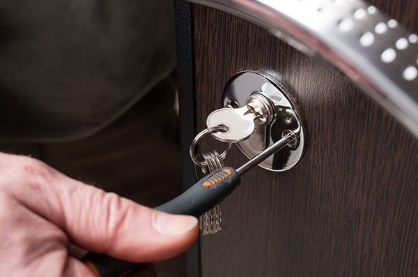 Fixing Door Lock — Denton, TX — Bryan & Sons Locksmith Inc