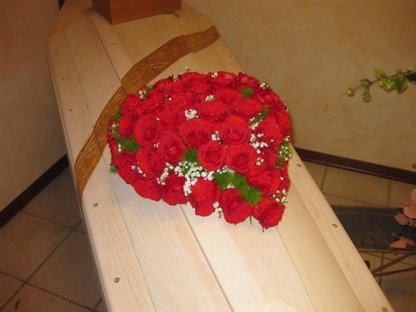 Copribara con rose rosse