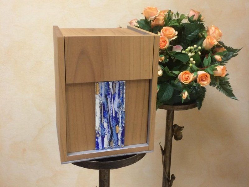 Urna cineraria e addobbi funebri