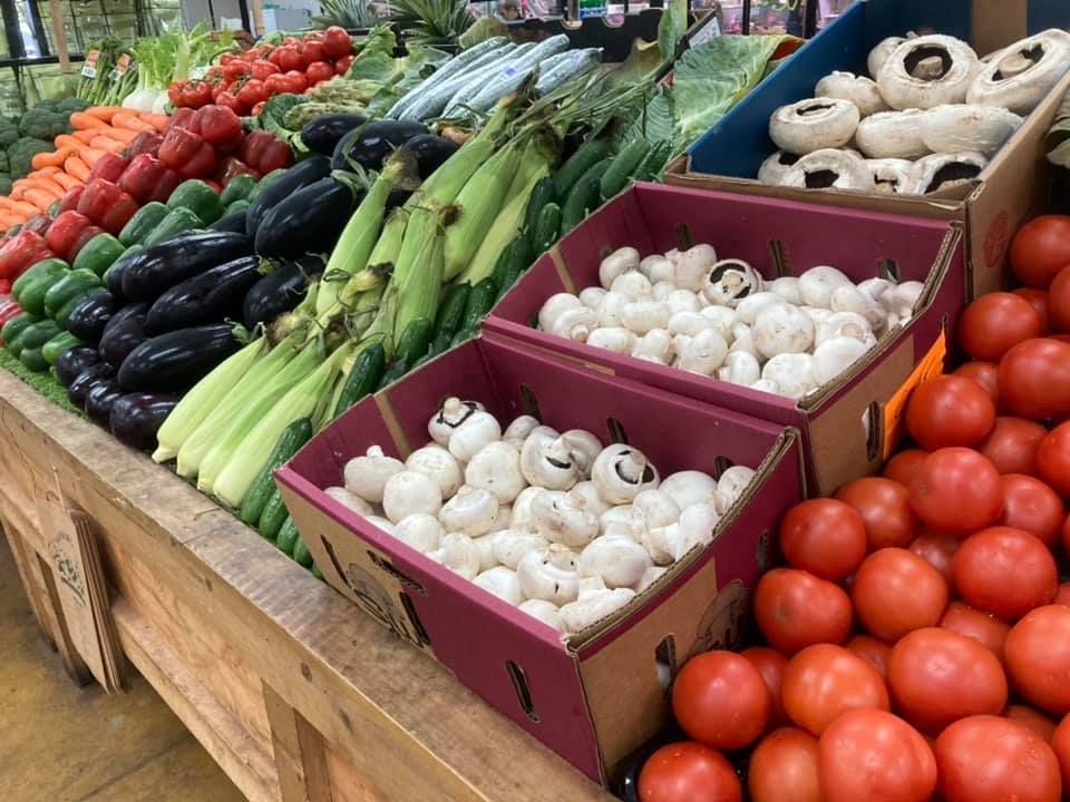 A Display Of Vegetables Including Mushrooms And Tomatoes — Start Fresh Fruit Market in Bundaberg Central QLD