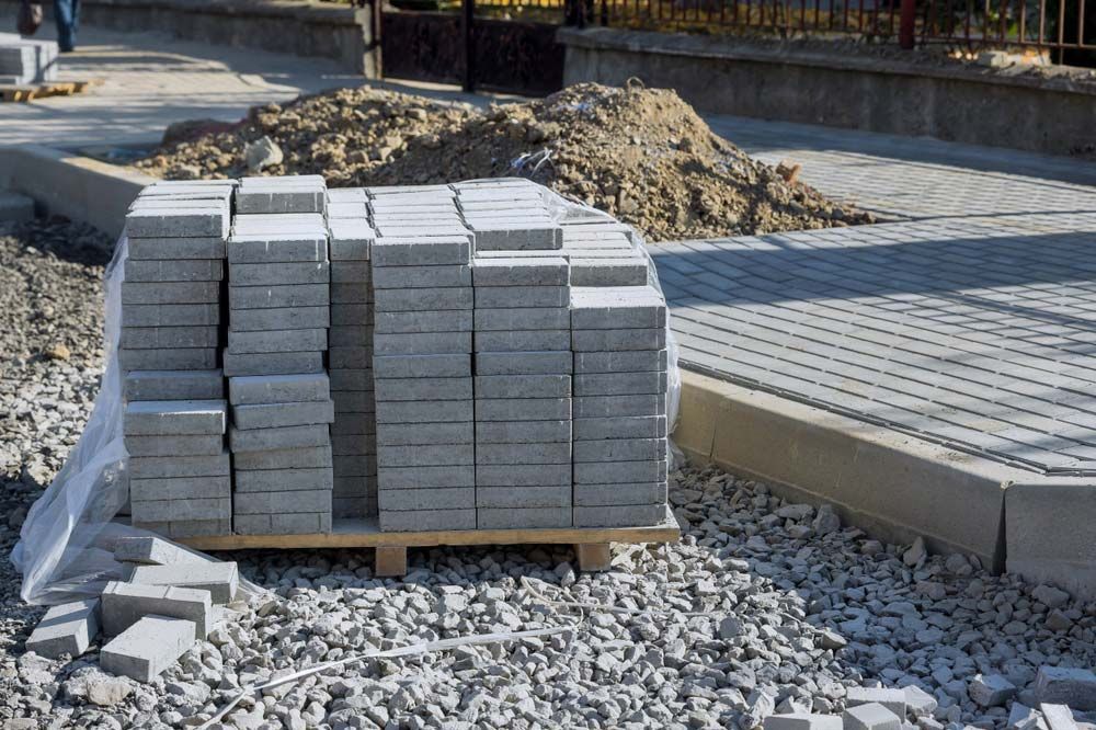 Preparation For Laying Gray Concrete Bricks — Ingham Concrete–Icon in Cardwell, QLD