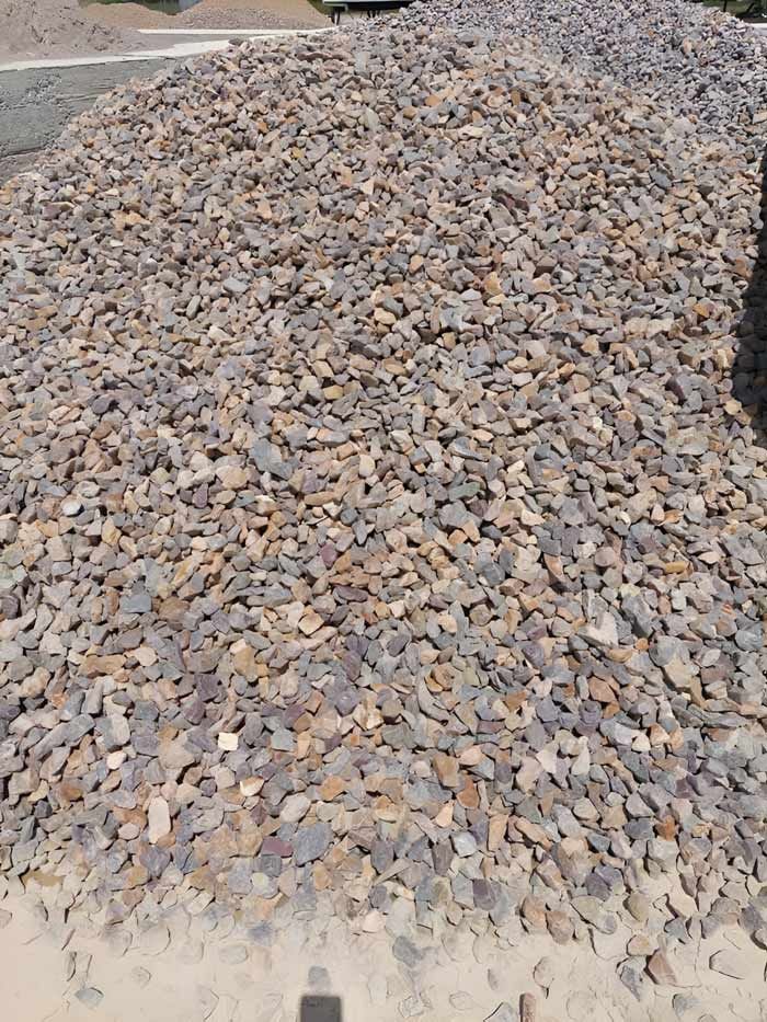 A Pile Of Decorative Gravel — Ingham Concrete–Icon in Ingham, QLD