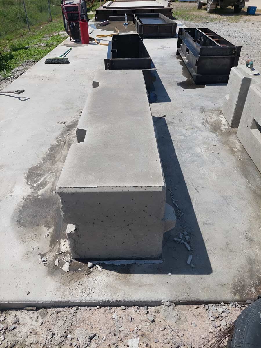 A Concrete Bench Is Sitting On Top Of A Concrete Surface — Ingham Concrete–Icon in Ingham, QLD