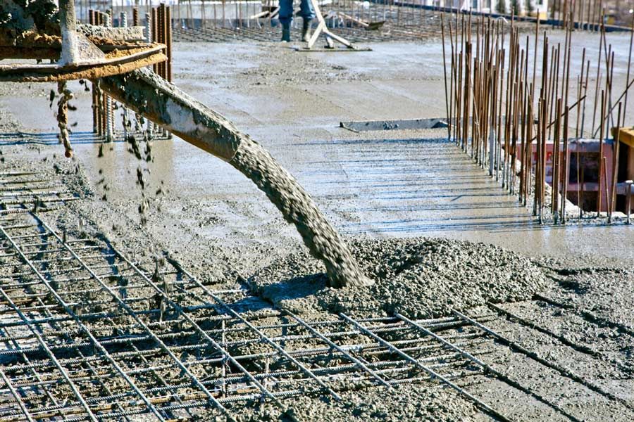 Concreting Floors Of Buildings In Construction Site — Ingham Concrete–Icon in Ingham, QLD