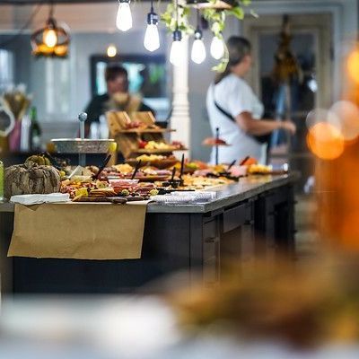 Birthday party places: Spread of food on bar