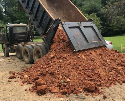 how much is a dump truck load of limestone