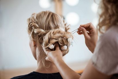 A Woman is Getting Her Hair Done by a Hairdresser in a Salon — Azure Hair in South Mackay, QLD