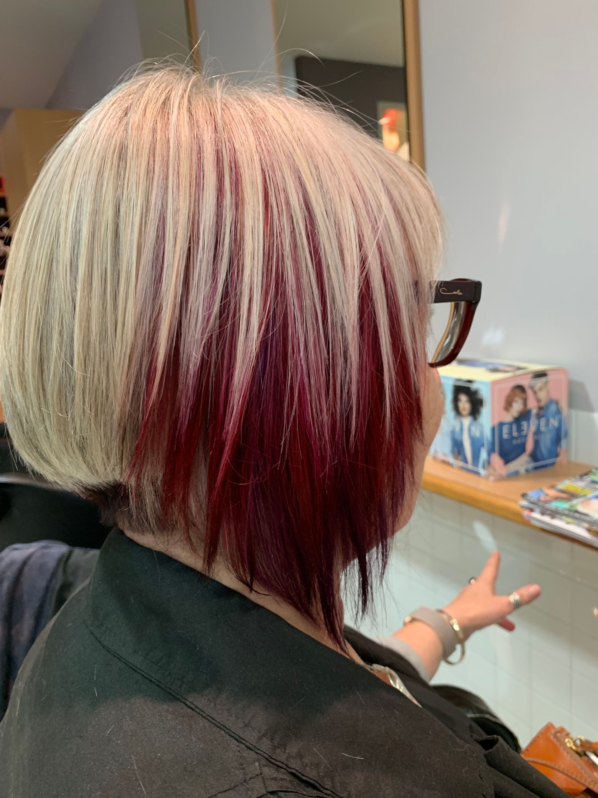 A Woman With Red Hair Has a Tattoo on Her Neck — Azure Hair in South Mackay, QLD